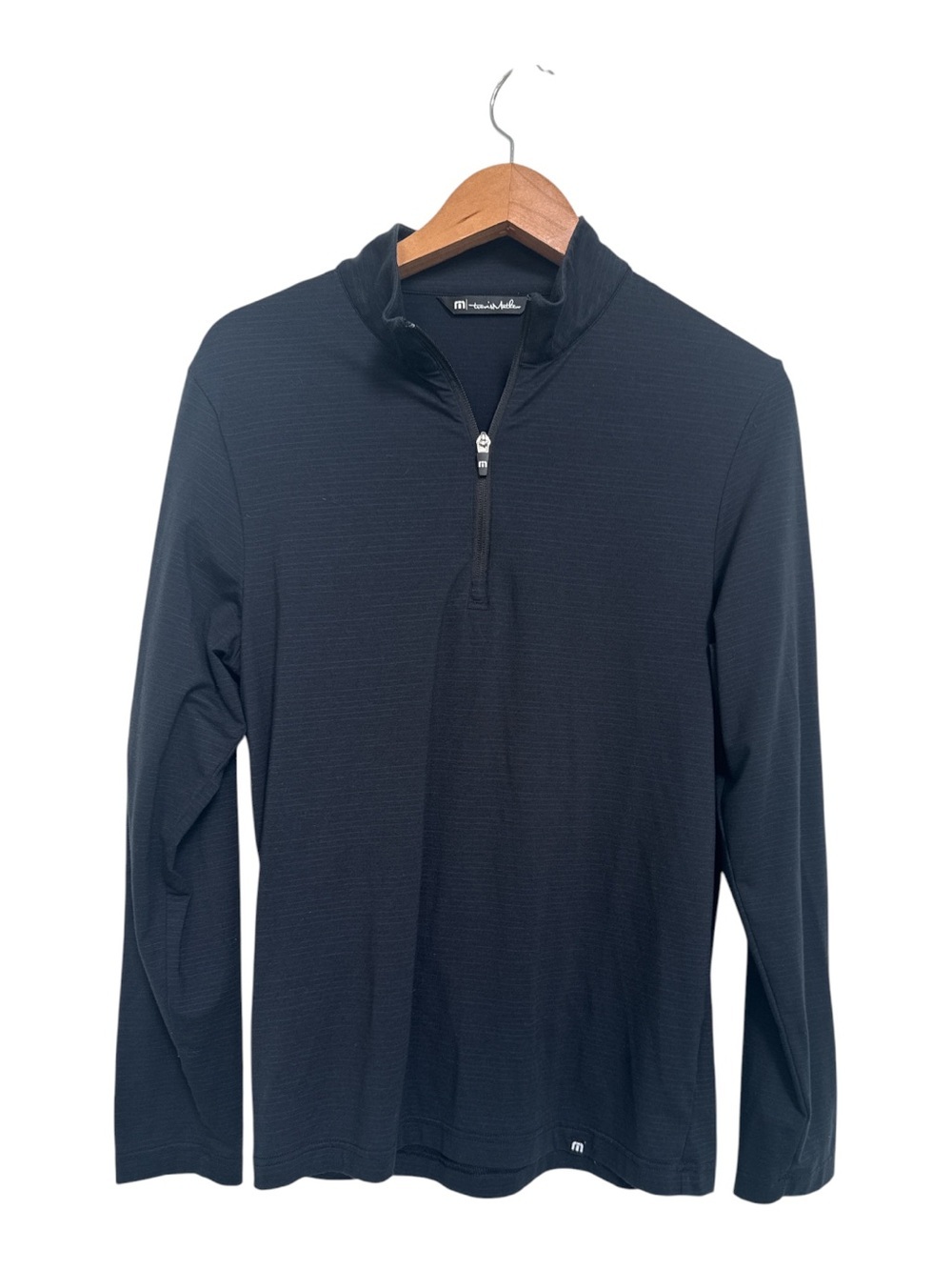 Travis Mathew’s Men’s Black Quarter-Zip Golf Pullover Shirt